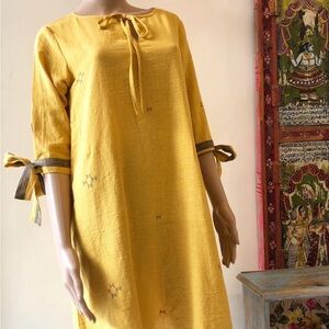 Mustard jamdani dress with bow tie at sleeves - sustainable homegrown handloom